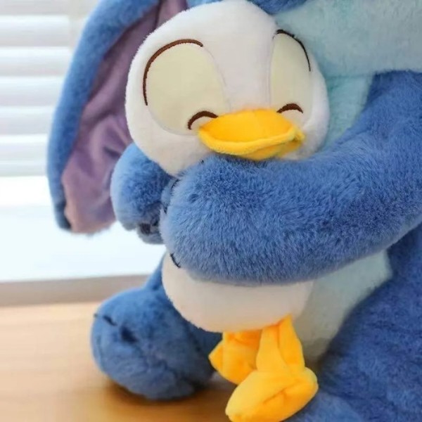 Фото - М'яка іграшка STITCH Стич з качкою 40 см (6928270764696)